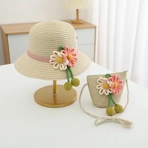 Kids beige straw sun hat and matching floral crossbody bag set for outdoor protection