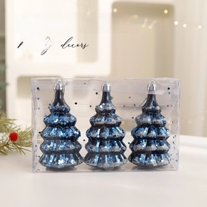 Three-piece set of deep blue glitter Christmas tree ornaments in a clear gift box