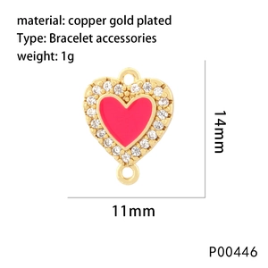 Detail view of 14mm x 11mm pink heart charm with gold plating and cubic zirconia inlay