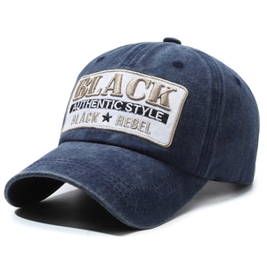 Vintage navy washed cotton baseball cap with embroidered patch and adjustable strap