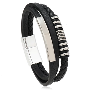 Macro detail of multi-layer braided leather bracelet with magnetic metal clasp