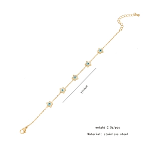 Detail view of a gold stainless steel star bracelet with blue evil eye charms and sizing info