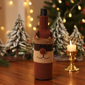Festive reindeer knitted wine bottle cover with 3D nose and antlers for Christmas decor