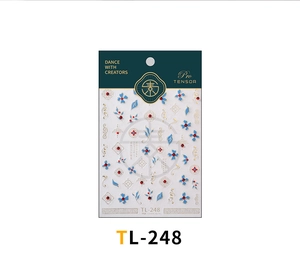 Detail of 3D embossed nail art stickers with gold, blue, and red floral patterns TL-248