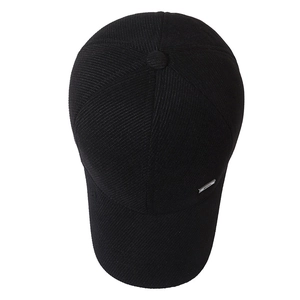 Warm men's winter corduroy baseball cap in black with plush lining and ear protection