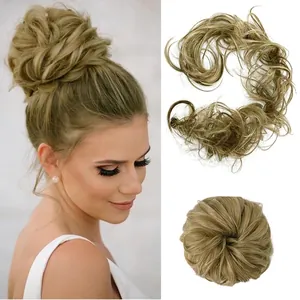 Detail of light brown messy bun hairpiece showing wavy texture and easy-to-wear design