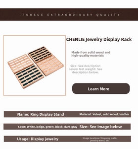 Detailed view of wooden jewelry display trays with velvet and leather ring organizers