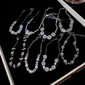Ensemble de bracelets argentés avec papillons en zircon, fleurs d'opale et cristaux de luxe