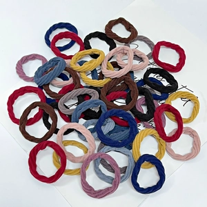 Colorful seamless elastic hair ties set in mixed vibrant colors on white background