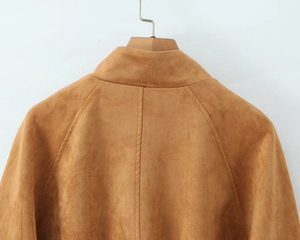 Close-up of the back shoulder seams and collar on this brown faux suede jacket