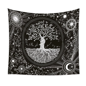 Detail of life tree tapestry featuring black and white celestial sun and moon patterns