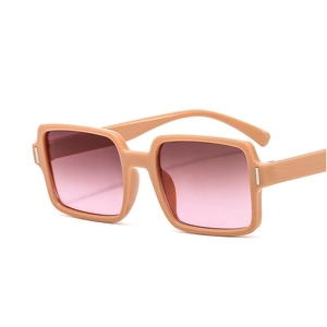 Fashionable square pink gradient sunglasses with a light orange frame in a 45-degree view