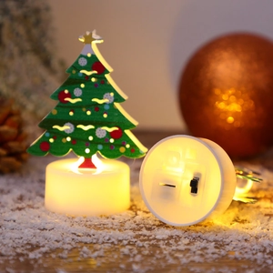 Festive Christmas tree LED night light with warm glow and decorative snowy base stand