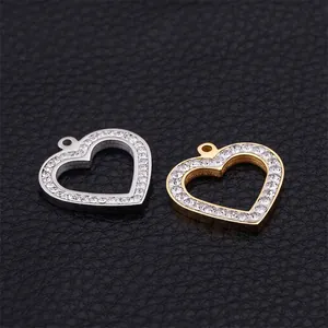 Hollow heart-shaped stainless steel pendants with rhinestones in gold and silver