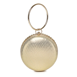 Macro view of champagne gold evening bag with rhinestone trim and round handle