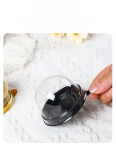 Detail showing transparent dome lid with black base and convenient small side handles
