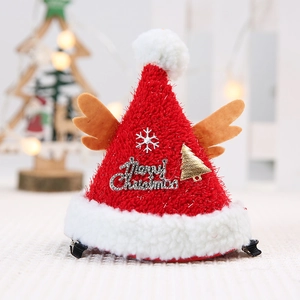 Plush Christmas hat hair clip with reindeer antlers and festive metal charms