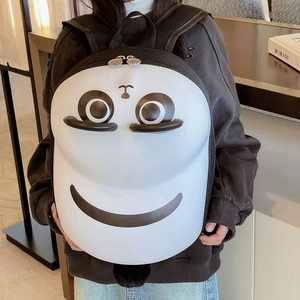 Cartoon white hard shell backpack for kids with minimalist face design and black straps
