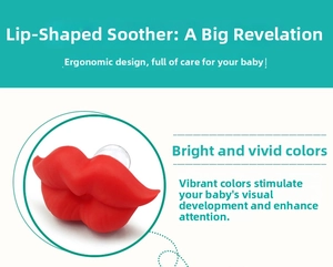 Close-up of a funny red lip-shaped silicone baby pacifier with ergonomic design