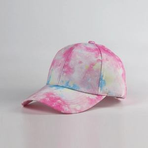 Detail view of colorful tie-dye patterns on a cotton six-panel baseball cap for sun protection