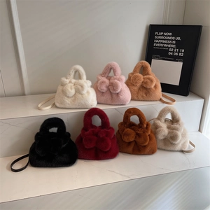 Cute plush bucket handbag for women featuring a bowknot and plush handle in 7 colors
