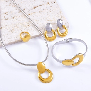 Elegant gold and silver tone jewelry set with snake chain, bracelet, earrings and ring