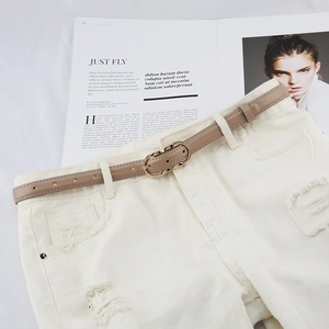 Light khaki slim waist belt with gold double-ring oval buckle on white denim jeans