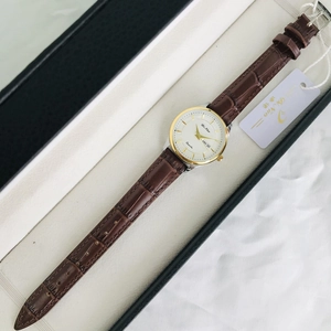 Women's quartz watch with gold and silver case, white dial and brown leather strap