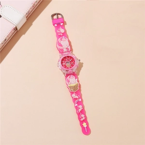 Close-up of pink children's watch featuring 3D cartoon unicorn and rainbow silicone strap