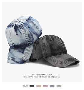 Close-up of vintage washed denim baseball caps with distressed brim details