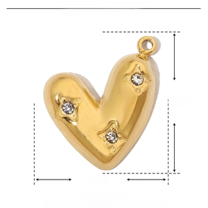 Detailed dimensions of a gold heart pendant with rhinestones and stainless steel specs