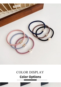 Close-up of high-elastic hair ties in six colors with rhinestone gold metal buckles