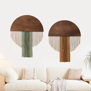 Bohemian woven cotton fringe wall hanging set with dark wood base in sage green and caramel