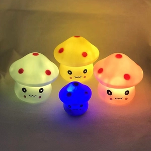 Glow-in-the-dark cartoon mushroom night lights in four colors with cute faces