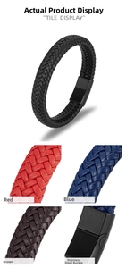 Macro detail of braided leather bracelets with minimalist black stainless steel clasps