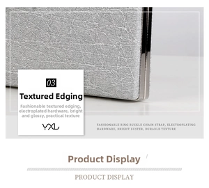 Detail of silver leaf clutch bag showing cross-woven texture and electroplated metal edges