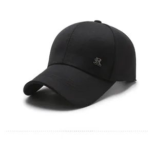 Detail view of black twill baseball cap with SR metal logo and triple stitched brim