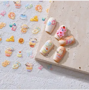 Macro detail of M-654 nail art stickers with cute dessert and animal patterns