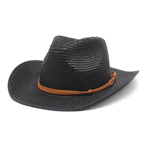 Classic black straw cowboy hat with wide brim and brown leather strap on white background