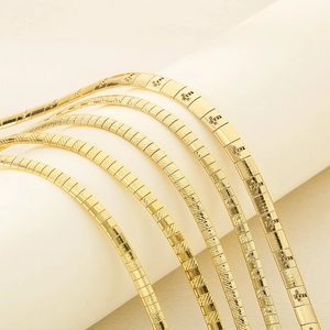 Flat gold stainless steel collar necklaces in various textures and engraved patterns