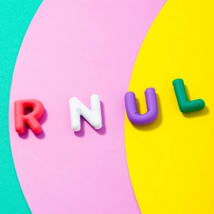 Detailed macro view of 3D colorful letter pendants R N U L with matte frosted finish