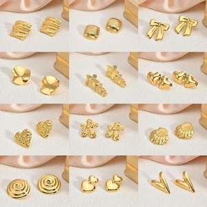 Collection of 12 stylish 18K gold plated stainless steel stud earrings in various designs