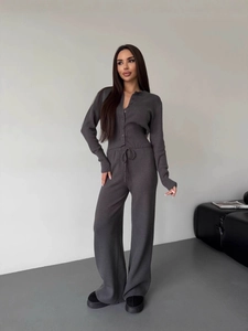 Deep grey knit lounge set featuring button-up long sleeve top and wide-leg drawstring pants
