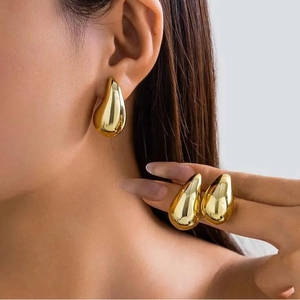 Polished gold teardrop earrings for women featuring a minimalist oversized drop design