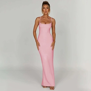 Detail of a pink backless slim fit maxi dress with elegant spaghetti straps and floor length