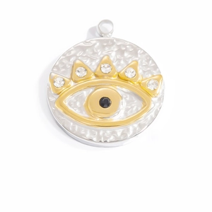 Detailed close-up of Evil Eye pendant with white zircons and gold-silver plating