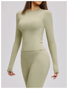 Close-up of olive green brushed long sleeve yoga set with high waist compression leggings