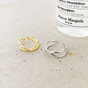 Minimalist irregular wavy cross-line open rings in gold and silver finishes