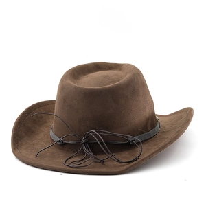 Macro detail of dark brown faux suede cowboy hat showing textured brim and leather cord band