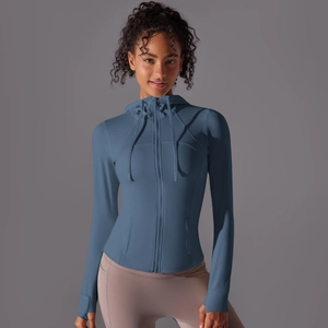 Close-up of slim fit hooded sports jacket with thumbhole cuffs and full zipper closure